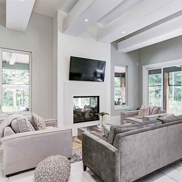 Living room with double-sided fireplace to outside