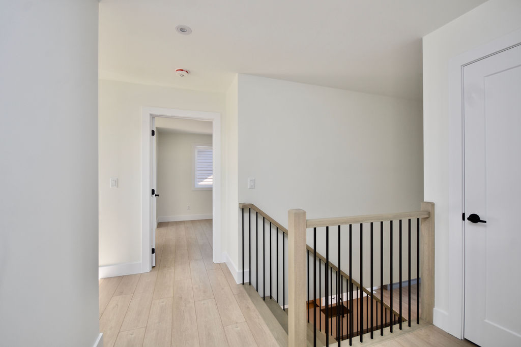 Top of the second floor stairs.