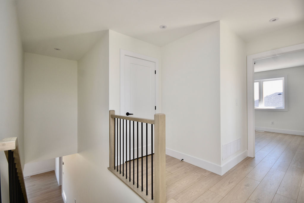 Second floor landing with linen closet.